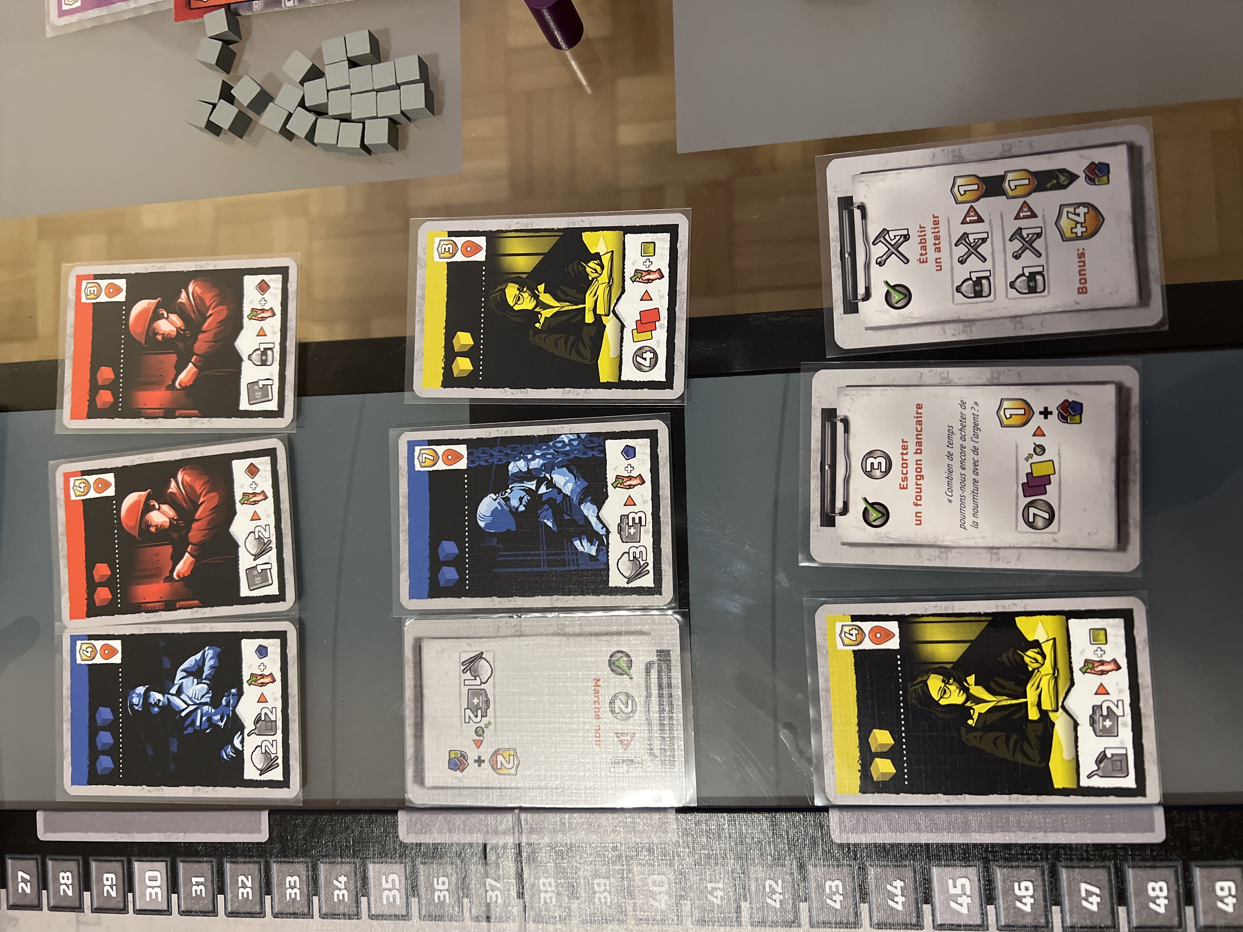 Plateau individuel de joueur dans Blackout hong-kong avec gestion des cartes et ressources