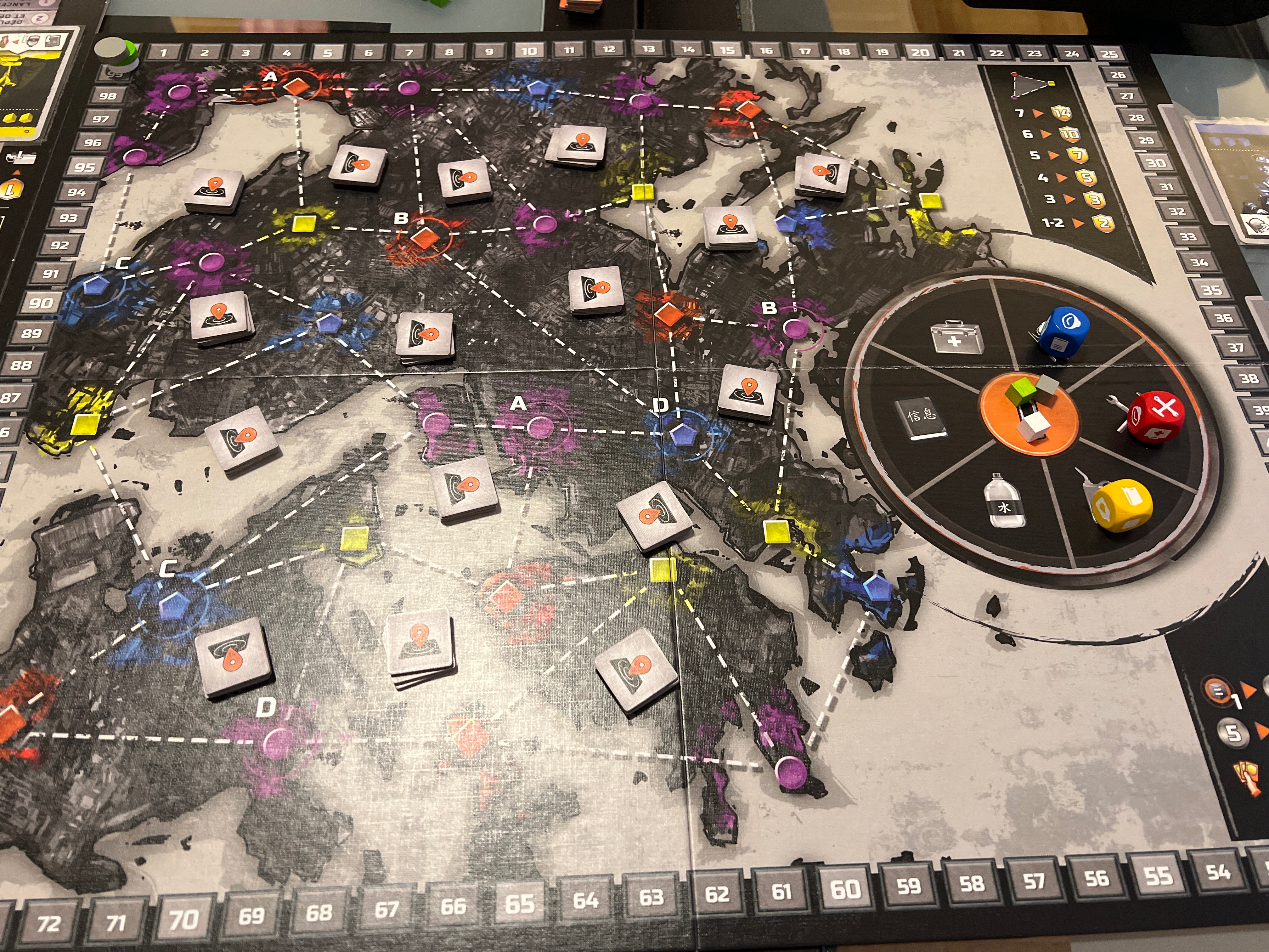 Vue d'ensemble du plateau de Blackout hong-kong en cours de partie à 3 joueurs
